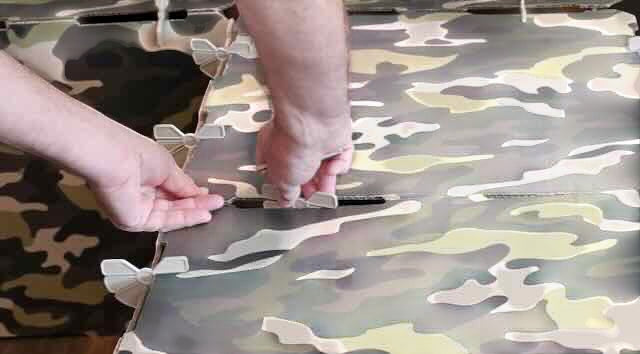 Kidz Forts patented plastic alloy connectors easily attach camouflage fort panels with twist-lock mechanism.