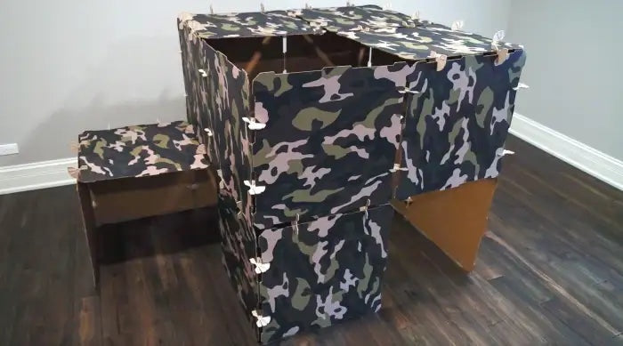 Kidz Forts Commando Kids Play Fort Kit with camouflage pattern, made from durable corrugated cardboard.