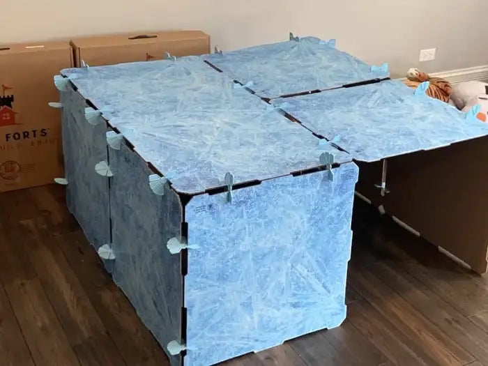 Kidz Forts Frosted Kit play fort made of durable, recyclable cardboard with a blue ice design and twist-lock connectors.
